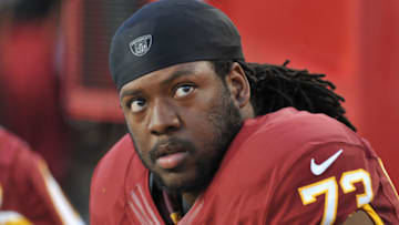 TAMPA, FL - AUGUST 29: Guard Adam Gettis #73 of the Washington Redskins watches play against the Tampa Bay Buccaneers August 29, 2013 at Raymond James Stadium in Tampa, Florida. (Photo by Al Messerschmidt/Getty Images)