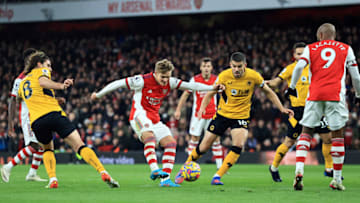 LONDON, ENGLAND - FEBRUARY 24: Martin Odegaard of Arsenal has a shot on goal during the Premier League match between Arsenal and Wolverhampton Wanderers at Emirates Stadium on February 24, 2022 in London, England. (Photo by David Rogers/Getty Images)