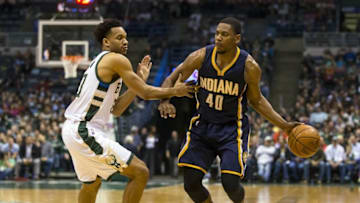 Apr 13, 2016; Milwaukee, WI, USA; Indiana Pacers guard Glenn Robinson III (40) looks to pass the ball around Milwaukee Bucks guard Rashad Vaughn (20) during the second quarter at BMO Harris Bradley Center. Mandatory Credit: Jeff Hanisch-USA TODAY Sports