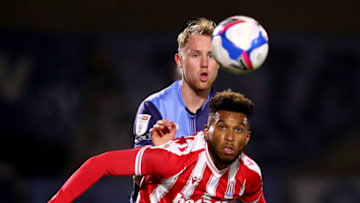 HIGH WYCOMBE, ENGLAND - DECEMBER 02: Jack Grimmer of Wycombe Wanderers in action with Tyrese Campbell of Stoke City during the Sky Bet Championship match between Wycombe Wanderers and Stoke City at Adams Park on December 02, 2020 in High Wycombe, England. A limited number of fans are welcomed back to stadiums to watch elite football across England. This was following easing of restrictions on spectators in tiers one and two areas only. (Photo by Marc Atkins/Getty Images)