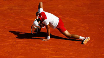 MONTE-CARLO, MONACO - APRIL 19: Novak Djokovic of Serbia in action against Dominic Thiem of Austria during his men's singles match on day five of the Rolex Monte-Carlo Masters at Monte-Carlo Sporting Club on April 19, 2018 in Monte-Carlo, Monaco. (Photo by Julian Finney/Getty Images)