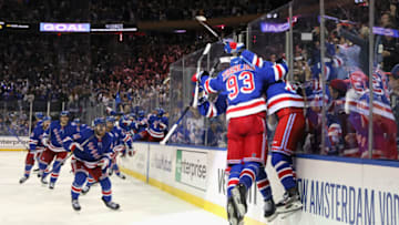 NEW YORK, NEW YORK - MAY 15: The New York Rangers celebrate their 4-3 victory over the Pittsburgh Penguins in Game Seven of the First Round of the 2022 Stanley Cup Playoffs at Madison Square Garden on May 15, 2022 in New York City. (Photo by Bruce Bennett/Getty Images)