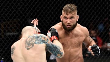 ORLANDO, FL - FEBRUARY 24: (R-L) Jeremy Stephens punches Josh Emmett in their featherweight bout during the UFC Fight Night event at Amway Center on February 24, 2018 in Orlando, Florida. (Photo by Jeff Bottari/Zuffa LLC/Zuffa LLC via Getty Images)