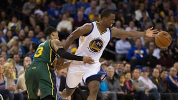 Mar 9, 2016; Oakland, CA, USA; Utah Jazz guard Trey Burke (3) fouls Golden State Warriors forward Harrison Barnes (40) during the second quarter at Oracle Arena. Mandatory Credit: Kelley L Cox-USA TODAY Sports
