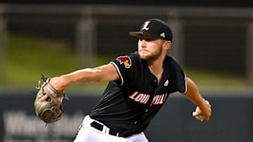 Jun 10, 2022; College Station, TX, USA; Louisville pitcher Tate Kuehner (40) delivers the pitch in the bottom of the fifth during the super regional against the Texas A&M Mandatory Credit: Maria Lysaker-USA TODAY Sports