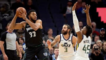 MINNEAPOLIS, MN - OCTOBER 31: Ricky Rubio #3 and Donovan Mitchell #45 of the Utah Jazz defend against Karl-Anthony Towns #32 of the Minnesota Timberwolves during the game on October 31, 2018 at the Target Center in Minneapolis, Minnesota. NOTE TO USER: User expressly acknowledges and agrees that, by downloading and or using this Photograph, user is consenting to the terms and conditions of the Getty Images License Agreement. (Photo by Hannah Foslien/Getty Images)
