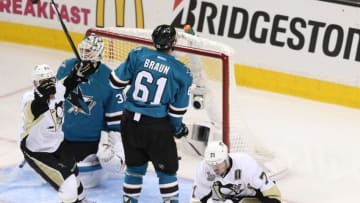 Jun 6, 2016; San Jose, CA, USA; Pittsburgh Penguins right wing Patric Hornqvist (72) and Penguins center Evgeni Malkin (71) celebrate a goal as San Jose Sharks goalie Martin Jones (31) and Sharks defenseman Justin Braun (61) react in the second period in game four of the 2016 Stanley Cup Final at SAP Center at San Jose. Mandatory Credit: John Hefti-USA TODAY Sports
