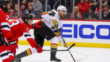 NEWARK, NJ - DECEMBER 03: Vegas Golden Knights center Chandler Stephenson (20) scores during the second period of the National Hockey League game between the New Jersey Devils and the Vegas Golden Knights on December 3, 2019 at the Prudential Center in Newark, NJ. (Photo by Rich Graessle/Icon Sportswire via Getty Images)