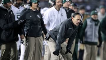 Nov 26, 2016; University Park, PA, USA; Michigan State Spartans head coach Mark Dantonio looks on from the sideline during the second quarter against the Penn State Nittany Lions at Beaver Stadium. Penn State defeated Michigan State 45-12. Mandatory Credit: Matthew O
