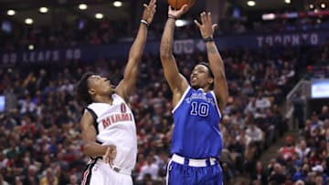 TORONTO, ON - APRIL 07: DeMar DeRozan #10 of the Toronto Raptors shoots as he is guarded by Josh Richardson #0 of the Miami Heat during NBA game action at Air Canada Centre on April 7, 2017 in Toronto, Canada. NOTE TO USER: User expressly acknowledges and agrees that, by downloading and or using this photograph, User is consenting to the terms and conditions of the Getty Images License Agreement. (Photo by Tom Szczerbowski/Getty Images)
