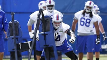 Jun 14, 2016; Orchard Park, NY, USA; Buffalo Bills guard Richie Incognito (64) hits the blocking sled during mini-camp at the ADPRO Sports Training Center. Mandatory Credit: Kevin Hoffman-USA TODAY Sports