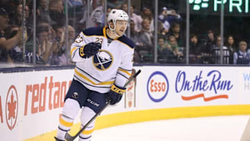 Mar 7, 2016; Toronto, Ontario, CAN; Buffalo Sabres center Sam Reinhart (23) celebrates after scoring a goal in the shootout against the Toronto Maple Leafs at Air Canada Centre. The Sabres beat the Maple Leafs 4-3 in a shootout. Mandatory Credit: Tom Szczerbowski-USA TODAY Sports