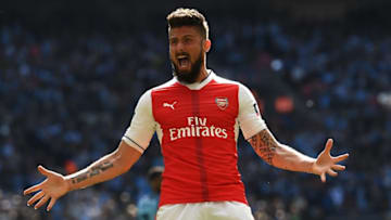 LONDON, ENGLAND - APRIL 23: Olivier Giroud of Arsenal celebrates after his side's first goal by Nacho Monreal (not pictured) during the Emirates FA Cup Semi-Final match between Arsenal and Manchester City at Wembley Stadium on April 23, 2017 in London, England. (Photo by Shaun Botterill/Getty Images,)
