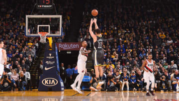 OAKLAND, CA - NOVEMBER 23: Klay Thompson #11 of the Golden State Warriors shoots the ball against the Portland Trail Blazers on November 23, 2018 at ORACLE Arena in Oakland, California. NOTE TO USER: User expressly acknowledges and agrees that, by downloading and or using this photograph, user is consenting to the terms and conditions of Getty Images License Agreement. Mandatory Copyright Notice: Copyright 2018 NBAE (Photo by Noah Graham/NBAE via Getty Images)