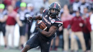BIRMINGHAM, AL - DECEMBER 29: South Carolina Gamecocks wide receiver Deebo Samuel (1) runs for a first down during the 2016 Birmingham Bowl between the South Carolina Gamecocks and South Florida Bulls on December 29, 2016, at Legion Field in Birmingham, AL. (Photo by Scott Donaldson/Icon Sportswire via Getty Images)