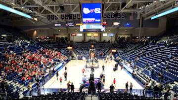 SPOKANE, WASHINGTON - DECEMBER 18: Players warm up on the court as the student fan section fills prior to the game between the North Carolina Tar Heels and the Gonzaga Bulldogs at McCarthey Athletic Center on December 18, 2019 in Spokane, Washington. (Photo by William Mancebo/Getty Images)