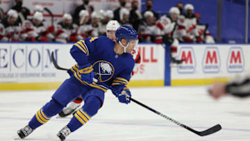 Jan 30, 2021; Buffalo, New York, USA; Buffalo Sabres left wing Taylor Hall (4) carries the puck up ice during the first period against the New Jersey Devils at KeyBank Center. Mandatory Credit: Timothy T. Ludwig-USA TODAY Sports
