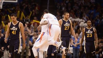 Mar 24, 2016; Oklahoma City, OK, USA; Oklahoma City Thunder forward Kevin Durant (35) is congratulated by center Enes Kanter (11) after a play against the Utah Jazz during the third quarter at Chesapeake Energy Arena. Mandatory Credit: Mark D. Smith-USA TODAY Sports