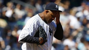 Apr 16, 2016; Bronx, NY, USA; New York Yankees starting pitcher CC Sabathia (52) reacts after giving up a home run in the fifth inning against the Seattle Mariners at Yankee Stadium. Mandatory Credit: Noah K. Murray-USA TODAY Sports