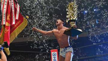 TOKYO, JAPAN - AUGUST 12: Kota Ibushi celebrates the victory with the trophy following the final bout during the New Japan Pro-Wrestling G1 Climax 29 at Nippon Budokan on August 12, 2019 in Tokyo, Japan. (Photo by Etsuo Hara/Getty Images)