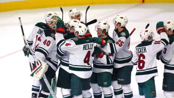 Mar 20, 2016; Chicago, IL, USA; The Minnesota Wild celebrate their victory following the shootout against the Chicago Blackhawks at the United Center. Minnesota won 3-2 in a shoot out. Mandatory Credit: Dennis Wierzbicki-USA TODAY Sports