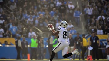 CARSON, CA - DECEMBER 31: Amari Cooper #89 of the Oakland Raiders makes the 87 yard catch for a touchdown during the second quarter of the game against the Los Angeles Chargers at StubHub Center on December 31, 2017 in Carson, California. (Photo by Harry How/Getty Images)
