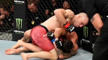 COPENHAGEN, DENMARK - SEPTEMBER 28: (L-R) Mark O. Madsen of Denmark punches Danilo Belluardo of Italy in their lightweight bout during the UFC Fight Night event at Royal Arena on September 28, 2019 in Copenhagen, Denmark. (Photo by Jeff Bottari/Zuffa LLC/Zuffa LLC via Getty Images)