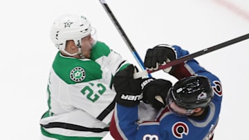 Esa Lindell #23 of the Dallas Stars and Cale Makar #8 of the Colorado Avalanche (Photo by Bruce Bennett/Getty Images)