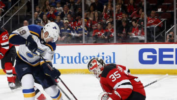 NEWARK, NJ - MARCH 30: Goalie Cory Schneider #35 of the New Jersey Devils stops a shot by Ivan Barbashev #49 of the St. Louis Blues in the first period of an NHL hockey game at the Prudential Center in Newark, New Jersey. (Photo by Paul Bereswill/Getty Images)
