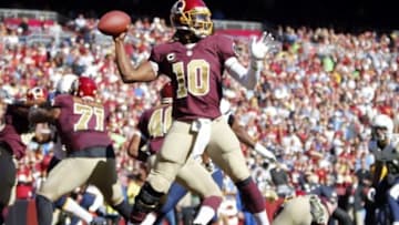 Nov 3, 2013; Landover, MD, USA; Washington Redskins quarterback Robert Griffin III (10) prepares to throw the ball against the San Diego Chargers in the first quarter at FedEx Field. Mandatory Credit: Geoff Burke-USA TODAY Sports