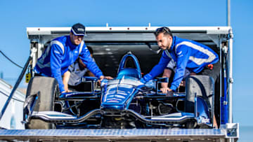 Carlin Racing crew members unload Max Chilton's car at ISM Raceway. Photo Credit: Andy Clary for Spacesuit Media/Courtesy of Carlin Racing