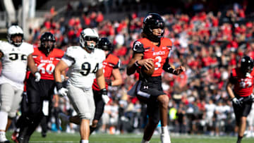 Cincinnati Bearcats quarterback Evan Prater scores a touchdown against UCF. USA Today.