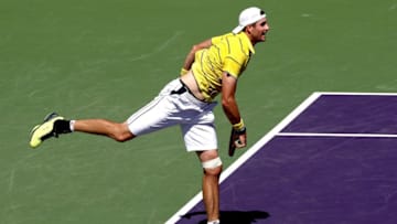 KEY BISCAYNE, FL - APRIL 01: John Isner serves to Alexander Zverev of German during the men's final of the Miami Open Presented by Itau at Crandon Park Tennis Center on April 1, 2018 in Key Biscayne, Florida. (Photo by Matthew Stockman/Getty Images)