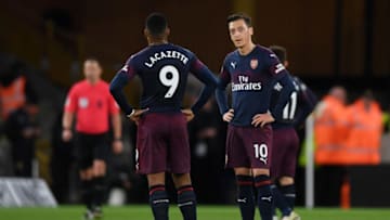 WOLVERHAMPTON, ENGLAND - APRIL 24: Mesut Ozil and Alexandre Lacazette of Arsenal look dejected during the Premier League match between Wolverhampton Wanderers and Arsenal FC at Molineux on April 24, 2019 in Wolverhampton, United Kingdom. (Photo by Laurence Griffiths/Getty Images)