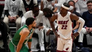 Jimmy Butler #22 of the Miami Heat talks with Jayson Tatum #0 of the Boston Celtics(Photo by Eric Espada/Getty Images)