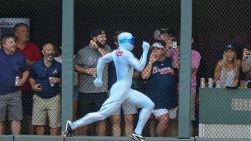 ATLANTA, GA JULY 14: Atlanta entertainment "The Freeze" runs against a fan in between innings during the game between Atlanta and Arizona on July 14th, 2018 at SunTrust Park in Atlanta, GA. The Arizona Diamondbacks beat the Atlanta Braves by a score of 3 0. (Photo by Rich von Biberstein/Icon Sportswire via Getty Images)