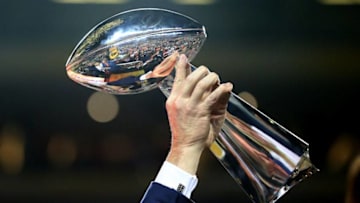 SANTA CLARA, CA - FEBRUARY 07: Denver Broncos John Elway holds up the Vince Lombardi Trophy (Photo by Ronald Martinez/Getty Images)