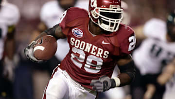 SAN DIEGO - DECEMBER 29: Running back Adrian Peterson #28 of the Oklahoma Sooners runs against the Oregon Ducks during the first half of the Pacific Life Holiday Bowl on December 29, 2005 at Qualcomm Stadium in San Diego, California. (Photo by Donald Miralle/Getty Images)