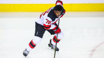 Mar 16, 2022; Calgary, Alberta, CAN; New Jersey Devils defenseman P.K. Subban (76) controls the puck during the warmup period against the Calgary Flames at Scotiabank Saddledome. Mandatory Credit: Sergei Belski-USA TODAY Sports