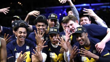 LOS ANGELES, CA - MARCH 24: The Michigan Wolverines celebrates after defeating the Florida State Seminoles in the 2018 NCAA Men's Basketball Tournament West Regional Final at Staples Center on March 24, 2018 in Los Angeles, California. The Michigan Wolverines defeated the Florida State Seminoles 58-54. (Photo by Ezra Shaw/Getty Images)