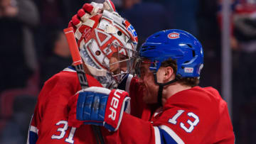 MONTREAL, QC - JANUARY 23: Montreal Canadiens center Max Domi (13) congratulates Montreal Canadiens goaltender Carey Price (31) at the end of the third period of the NHL game between the Arizona Coyotes and the Montreal Canadiens on January 23, 2019, at the Bell Centre in Montreal, QC (Photo by Vincent Ethier/Icon Sportswire via Getty Images)