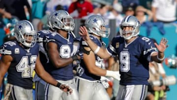 Nov 22, 2015; Miami Gardens, FL, USA; Dallas Cowboys quarterback Tony Romo (9) smiles after defeating the Miami Dolphins 24-14 at Sun Life Stadium. The Cowboys won 24-14. Mandatory Credit: Steve Mitchell-USA TODAY Sports