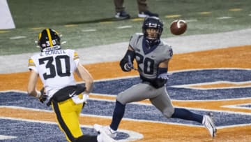 Dec 5, 2020; Champaign, Illinois, USA; Illinois Fighting Illini wide receiver Kyron Cumby (20) catches a pass for a touchdown against the Iowa Hawkeyes during the second half at Memorial Stadium. Mandatory Credit: Patrick Gorski-USA TODAY Sports