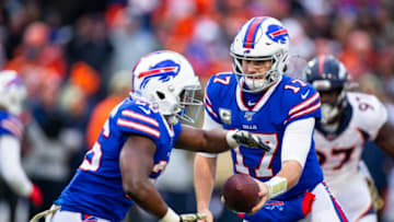 Josh Allen #17 hands the ball off to Devin Singletary #26 of the Buffalo Bills during the third quarter against the Denver Broncos at New Era Field. (Photo by Brett Carlsen/Getty Images)