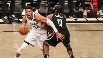 Jun 19, 2021; Brooklyn, New York, USA; Milwaukee Bucks forward Giannis Antetokounmpo (34) and Brooklyn Nets guard James Harden (13) during game seven in the second round of the 2021 NBA Playoffs at Barclays Center. Mandatory Credit: Wendell Cruz-USA TODAY Sports