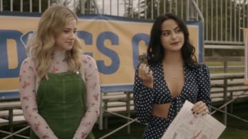 Riverdale -- “Chapter Seventy-Nine: Graduation” -- Image Number: RVD503fg_0090r -- Pictured (L-R): Lili Reinhart as Betty Cooper and Camila Mendes as Veronica Lodge -- Photo: The CW -- © 2021 The CW Network, LLC. All Rights Reserved.