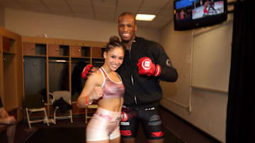 UNCASVILLE, CT - FEBRUARY 16: Valerie Loureda (L) and Michael Page backstage at Paul Daley Vs Michael Page at Mohegan Sun Arena on February 16, 2019 in Uncasville, Connecticut. (Photo by Johnny Nunez/WireImage)