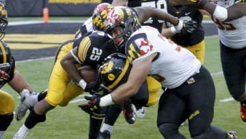 IOWA CITY, IA - OCTOBER 31: Linebacker Brett Zanotto #38 of the Maryland Terrapins makes a tackle on running back Akrum Wadley #25 of the Iowa Hawkeyes in the second half on October 31, 2015 at Kinnick Stadium, in Iowa City, Iowa. (Photo by Matthew Holst/Getty Images)