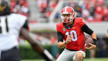 Oct 15, 2016; Athens, GA, USA; Georgia Bulldogs quarterback Jacob Eason (10) runs with the ball against the Vanderbilt Commodores during the second half at Sanford Stadium. Vanderbilt defeated Georgia 17-16. Mandatory Credit: Dale Zanine-USA TODAY Sports