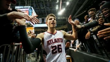 Jan 7, 2015; Atlanta, GA, USA; Atlanta Hawks guard Kyle Korver (26) greets fans after defeating the Memphis Grizzlies 96-86 at Philips Arena. Mandatory Credit: Kevin Liles-USA TODAY Sports